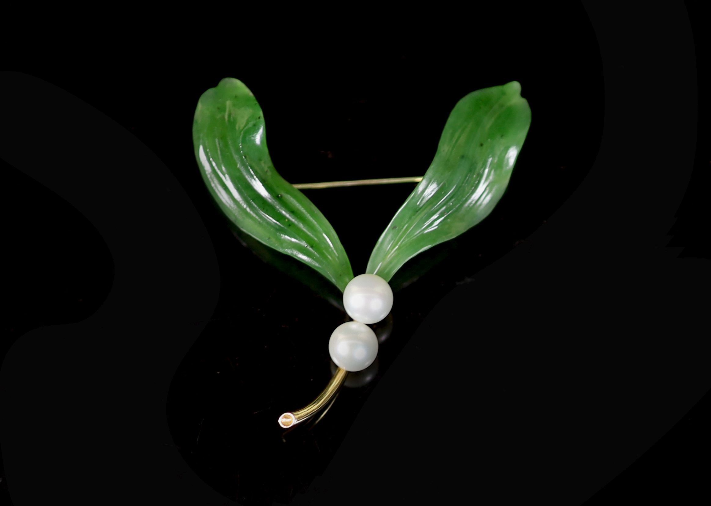 An early 20th century Austro Hungarian 18ct gold, nephrite and pearl set mistletoe brooch by Julius Hugler, Vienna